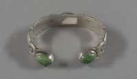 Navajo%20artist%2C%20%3Cb%3E%3Ci%3E%20Stamped%20Bracelet%3C%2Fi%3E%3C%2Fb%3E%2C%20ca.%201920%2C%20silver%20and%20turquoise%2C%20The%20Elizabeth%20Cole%20Butler%20Collection%2C%20no%20known%20copyright%20restrictions%2C%202012.92.151